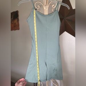 Yogalicious Illusion Rib Lotus Romper
 25in L 12 1/2in W Good stretch workout